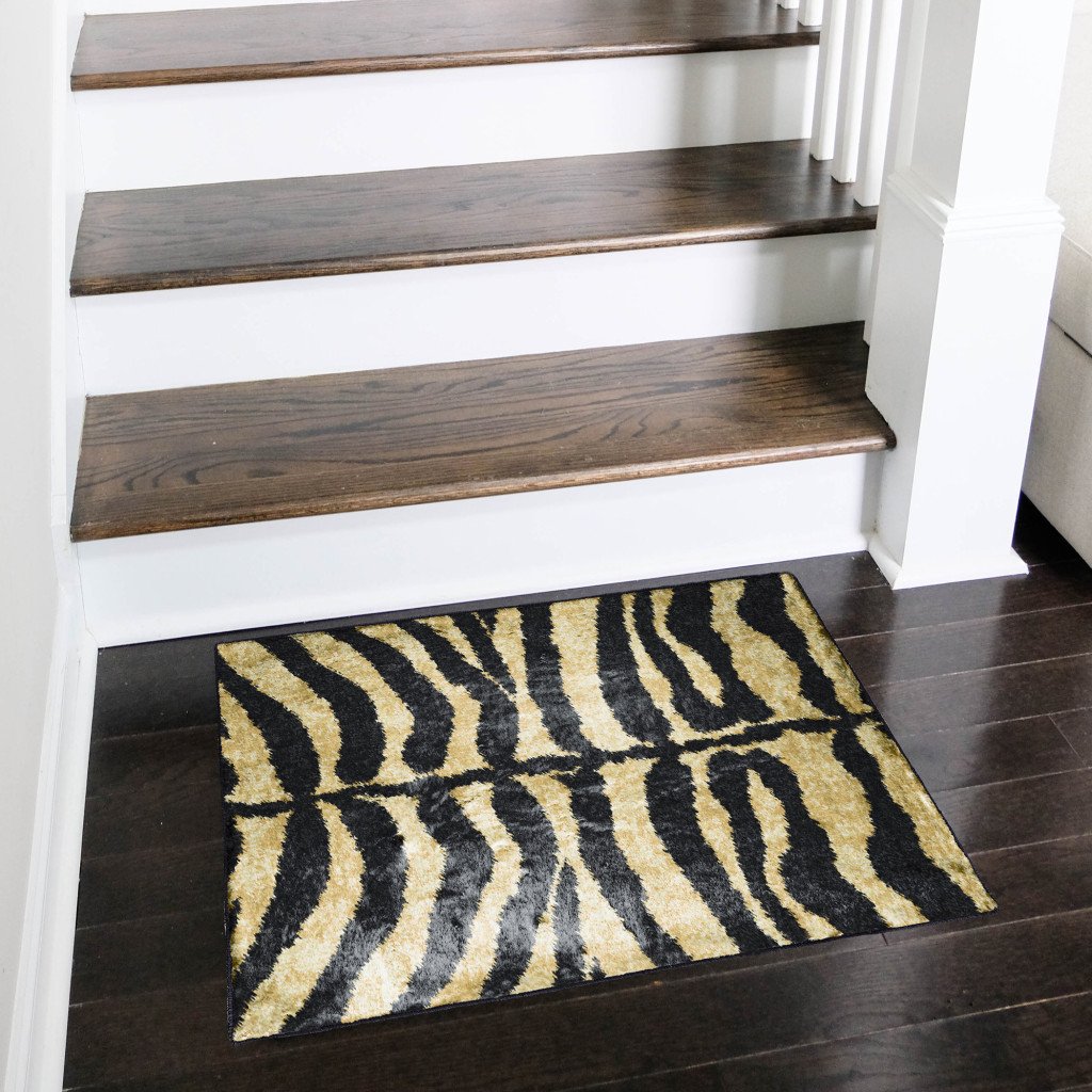 Picture of HomeRoots 491631 2 x 3 ft. Black & Gold Animal Print Shag Handmade Non Skid Rectangle Area Rug