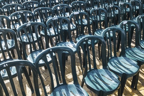 Plastic Green Chairs Lined Up in Rows - Malaga Province Andalusia Spain Poster Print by Ben Welsh - 19 x 12