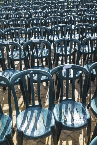 Plastic Green Chairs Lined Up in Rows - Malaga Province Andalusia Spain Poster Print by Ben Welsh - 12 x 19