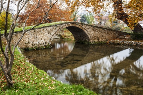 Stone Bridge Over A Tranquil River - Edessa Greece Poster Print - Large