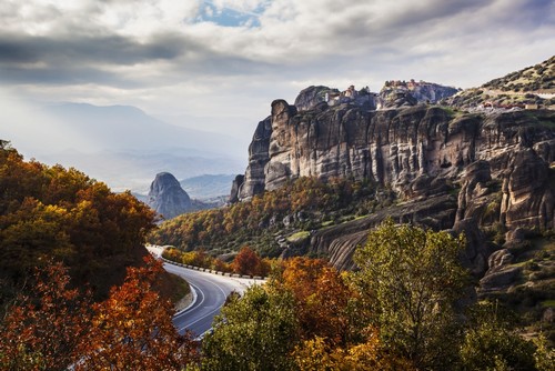 DPI12286687 Monasteries Perched On Cliffs & A Winding Road in Autumn Foliage - Meteora Greece Poster Print by Reynold Mainse, 19 x 12