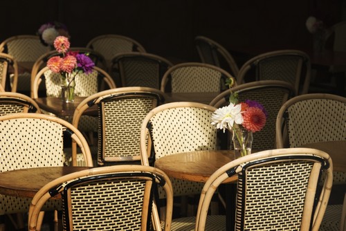 DPI12286421 A Bouquet of Flowers Amongst Empty Parisian Bistro Chairs & Tables - Paris France Poster Print by Philippe Widling, 20 x 13