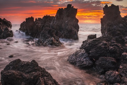 The Colours of Sunrise Behind Coastal Lava Rocks - Laupahoehoe Island of Hawaii United States of America Poster Print by Carl Johnson - 19 x 12