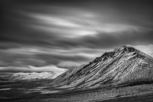 Black & White Long Exposure of Clouds Over The Cloudy Range Along The Dempster Highway - Yukon Canada Poster Print by Robert Postma - 19 x 12