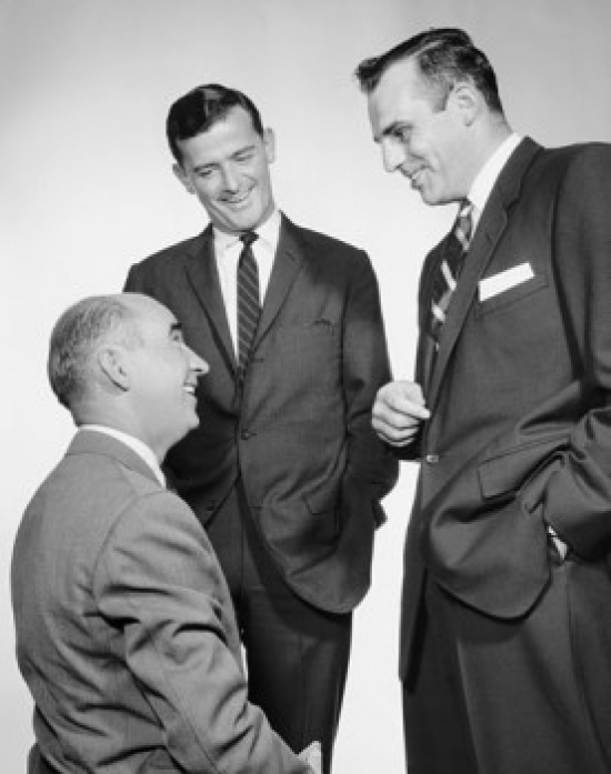 Three Businessmen Talking Poster Print - 18 x 24 in.