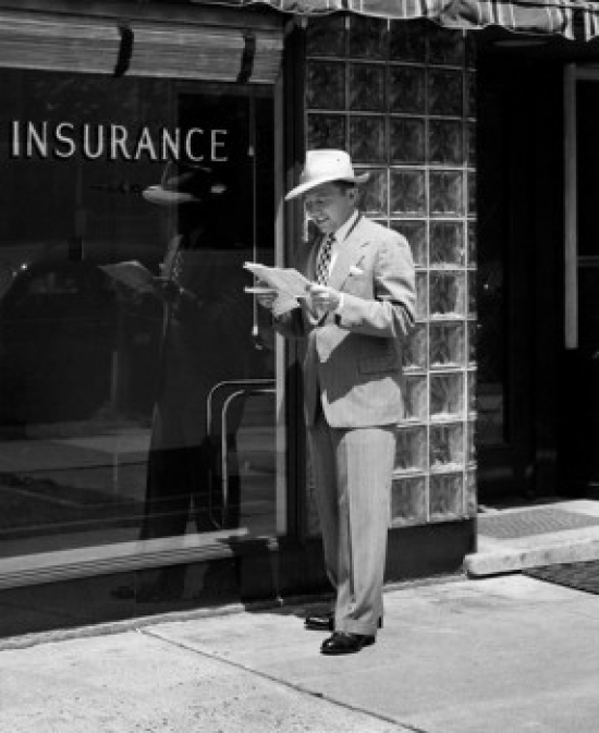 Man Holding Documents Standing in Front of Insurance Company Poster Print
