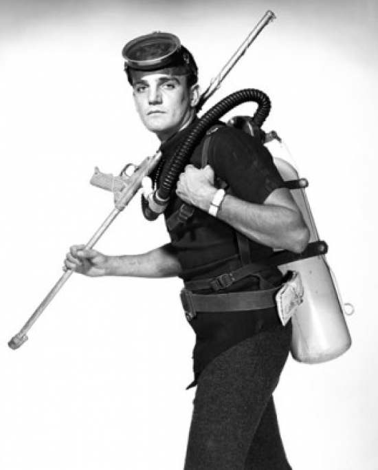 Scuba Diver Carrying Oxygen Tank & Speargun Poster Print - 18 x 24 in.