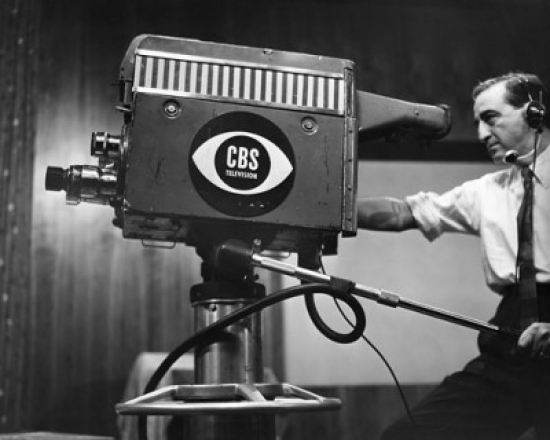 Side Profile of a Cameraman Shooting in a Television Studio Poster Print
