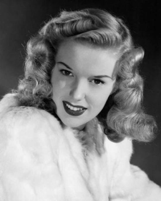 Portrait of a Young Woman Smiling Poster Print - 18 x 24 in.