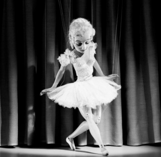 Close-Up of a Puppet Dancing Poster Print - 18 x 24 in.