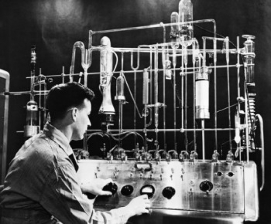 Side Profile of an Engineer Operating Vacuum Fusion Gas Analyzer in a Laboratory Poster Print