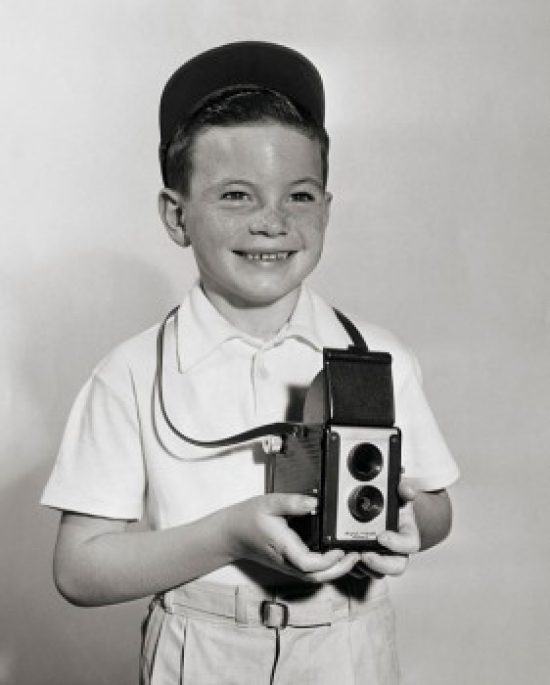 Boy Holding Camera Poster Print - 18 x 24 in.