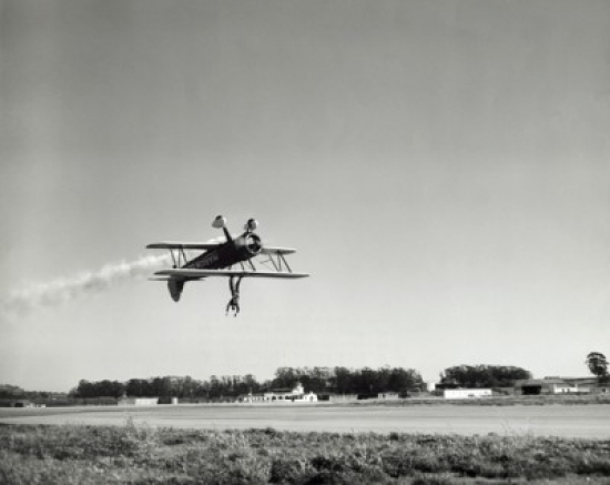 Low Angle View of an Aircraft Upside Down in Flight with Wing Walker Poster Print - 18 x 24 in.