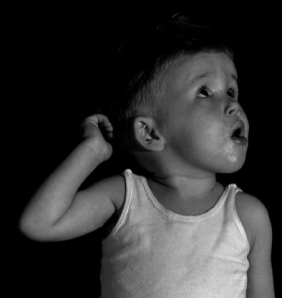 Baby Boy in Tank Top Looking Up with Mouth Open Poster Print - 18 x 24 in.