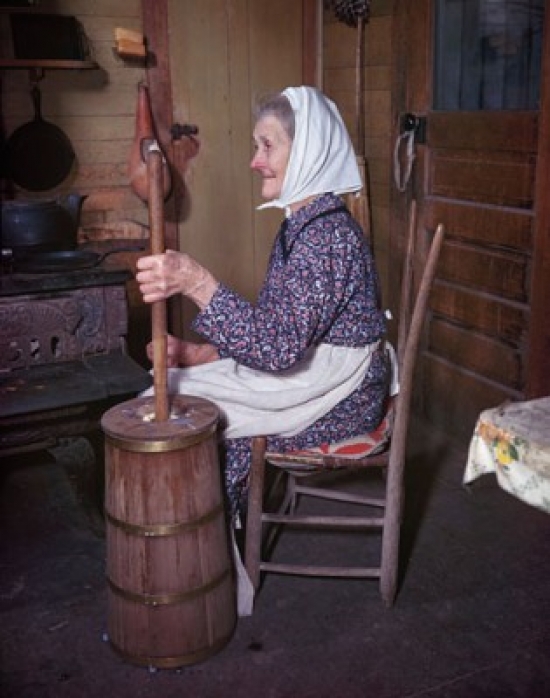 SAL34564584 Side Profile of a Senior Woman Sitting & Churning Butter Poster Print - 18 x 24 in.