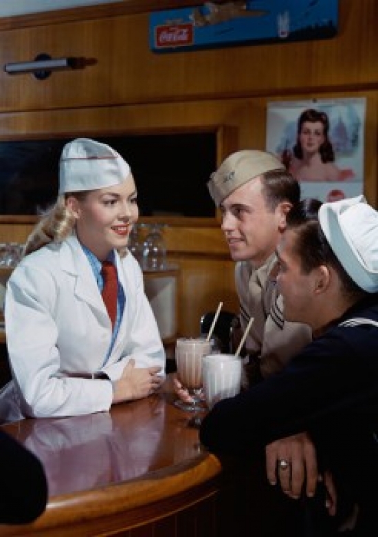 View of Soldier Standing at a Bar Counter Talking to a Young Woman Poster Print - 18 x 24 in.