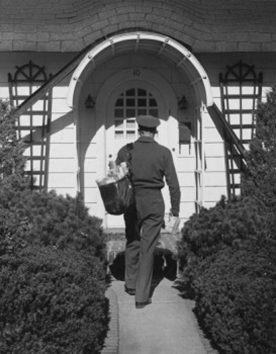 Rear View of a Postman Delivering Mail Poster Print - 18 x 24 in.