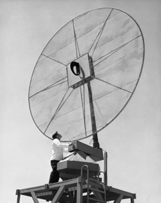 SAL25535525 Low Angle View of an Engineer Standing in Front of a Scimitar Antenna Poster Print - 18 x 24 in.