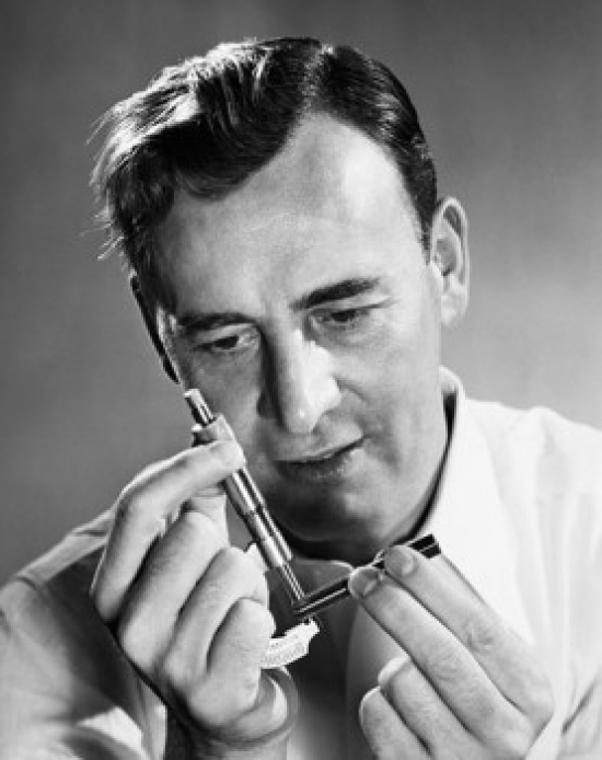 Scientist Using a Micrometer Screw Gauge Poster Print - 18 x 24 in.