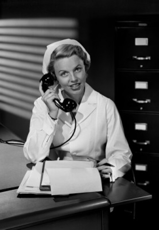 Female Nurse Using Telephone Poster Print - 18 x 24 in.