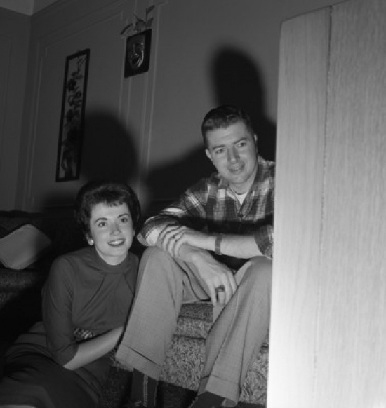 Young Couple Watching Television Poster Print - 18 x 24 in.