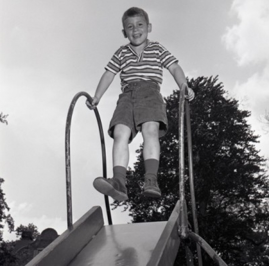 Boy on Slide Poster Print - 18 x 24 in.