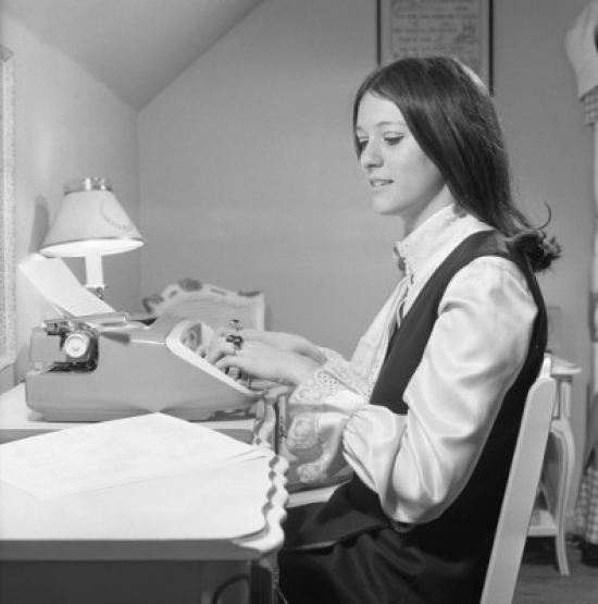 Young Woman Working in Office Poster Print - 18 x 24 in.
