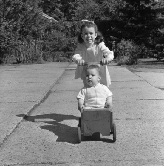 Girl Pulling Wagon with Baby Brother Poster Print - 18 x 24 in.