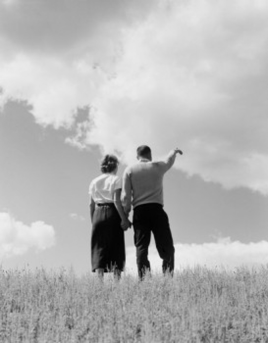 Young Couple Standing & Holding Hands Rear View Poster Print - 18 x 24 in.
