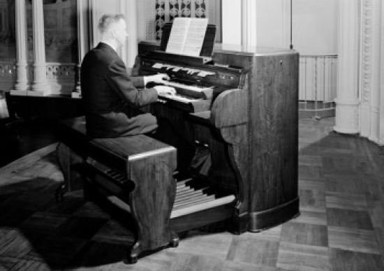 Man Playing Organ Poster Print - 18 x 24 in.