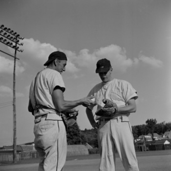 Two Baseball Players Talking Poster Print - 18 x 24 in.