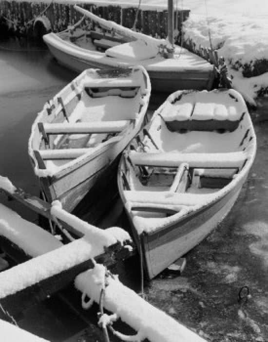 Snow-Covered Rowboats. Poster Print - 18 x 24 in.