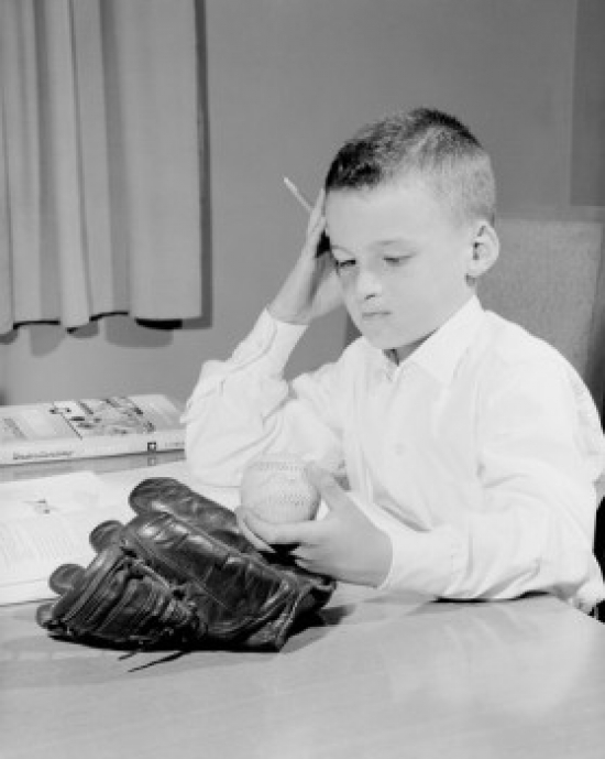USA Boy with Baseball & Glove Doing Homework Poster Print - 18 x 24 in.