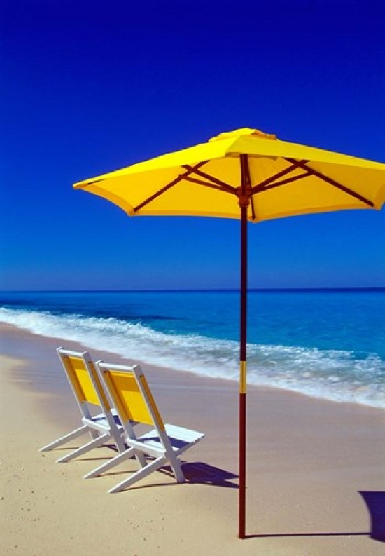 Yellow Chairs & Umbrella on Pristine Beach Caribbean Poster Print by Greg Johnston - 25 x 35 in.