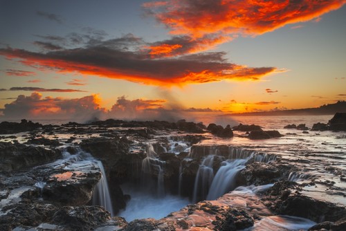 Surf Spills Into A Hole in a Rock Outcrop At Sunrise On The East Side of Kauai Poster Print by Carl Johnson - 38 x 24 - Large