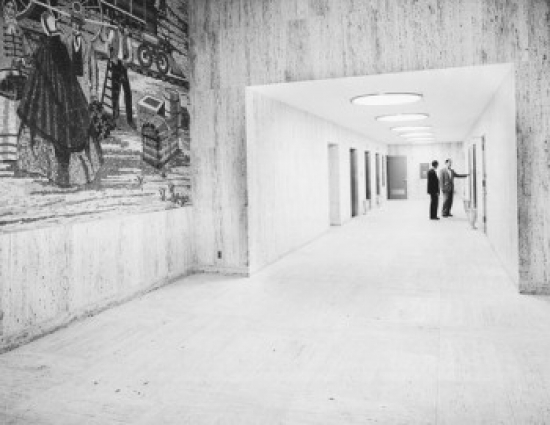 Two Businessmen Standing in a Corridor Poster Print - 18 x 24 in.