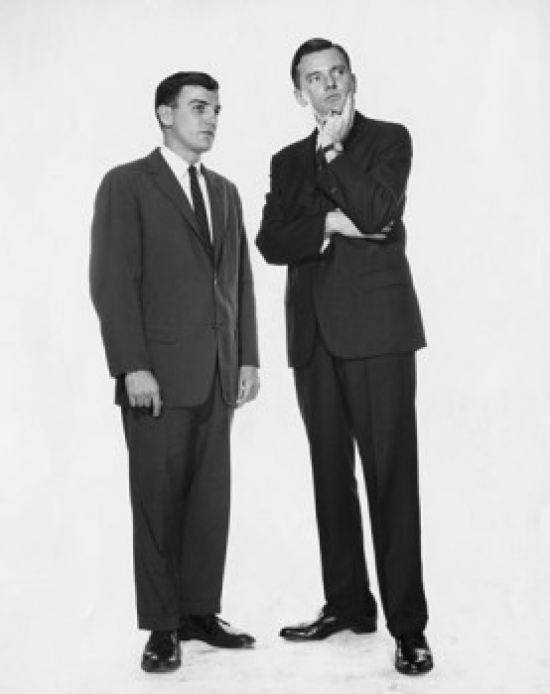 Two Businessmen Standing Together Poster Print - 18 x 24 in.