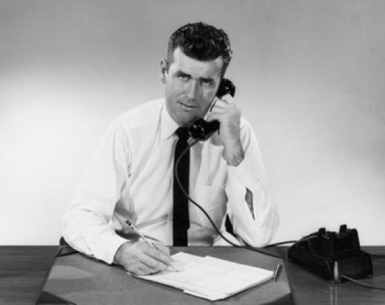 Businessman Using Telephone in Office Poster Print - 18 x 24 in.