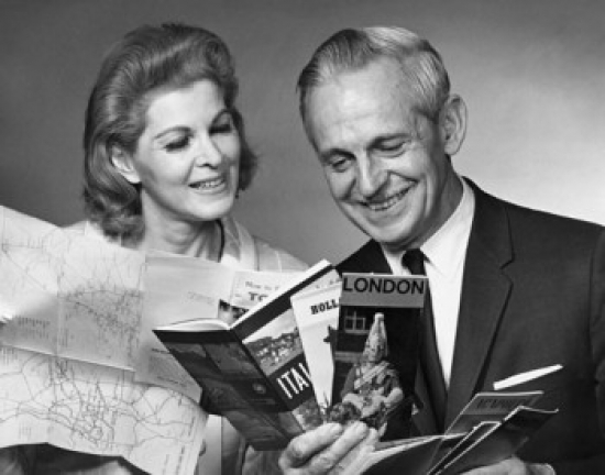 SAL25548875 Close-Up of a Senior Couple Looking at Brochures Poster Print - 18 x 24 in.