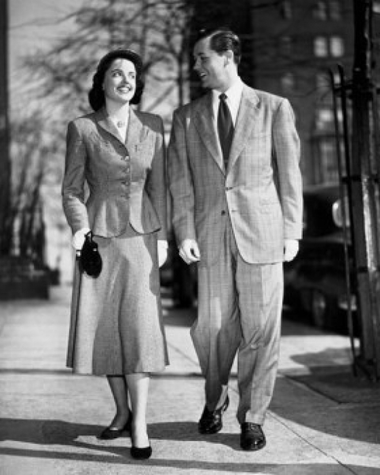 Young Couple Walking on Sidewalk Poster Print - 18 x 24 in.