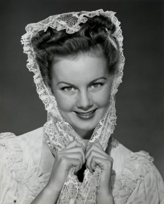 Portrait of a Young Woman Smiling Poster Print - 18 x 24 in.