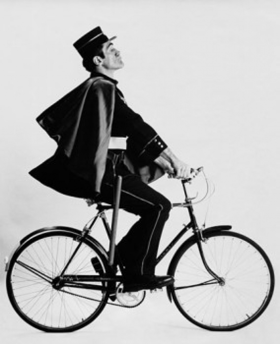 Male Policeman Riding a Bicycle Poster Print - 18 x 24 in.