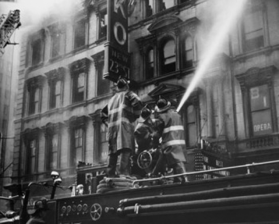 Low Angle View of Three Firemen Spraying Water on a Burning Movie Theater New York City New York State USA 18 x 24 in.