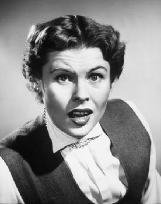 Portrait of a Young Woman Looking Surprised Poster Print - 18 x 24 in.