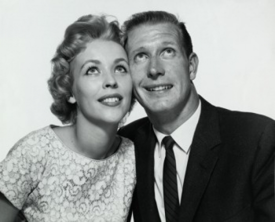 SAL2557607 Close-Up of a Young Couple Looking Up Poster Print - 18 x 24 in.