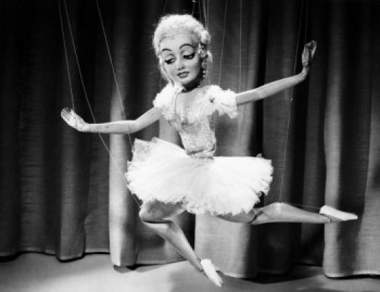 Close-Up of a Puppet Dancing Poster Print - 18 x 24 in.