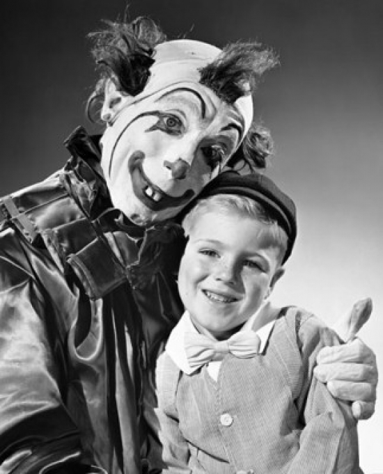 Clown Hugging a Boy & Smiling Poster Print - 18 x 24 in.