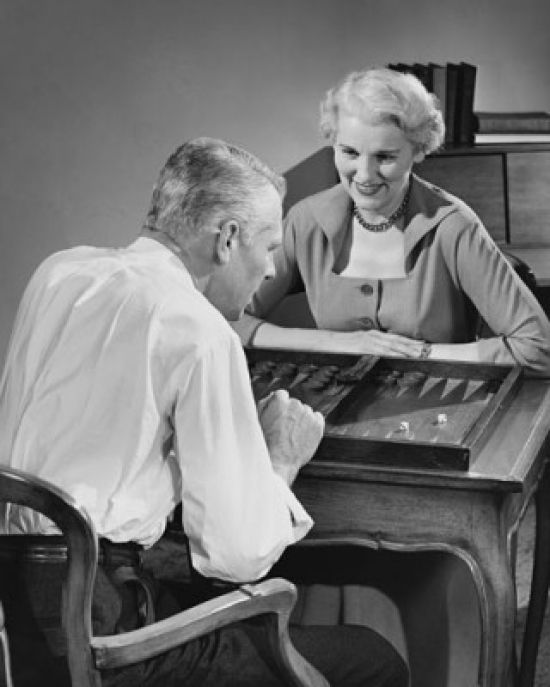 Senior Couple Playing Backgammon Poster Print - 18 x 24 in.
