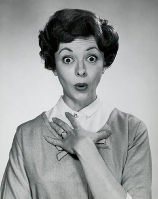 Portrait of a Young Woman Looking Surprised Poster Print - 18 x 24 in.