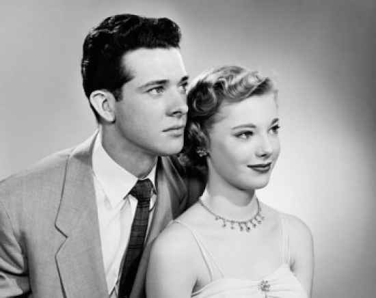 Young Couple Smiling Looking Away Poster Print - 18 x 24 in.